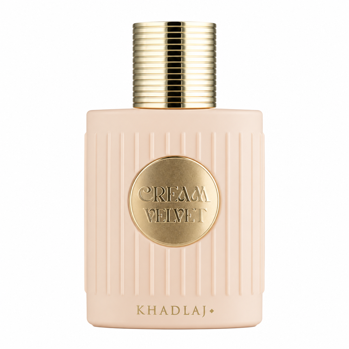 Khadlaj Cream Velvet presented in a soft ivory-cream bottle with refined vertical detailing, a polished gold cap and central gold medallion, creating a warm, luxurious gourmand aesthetic.